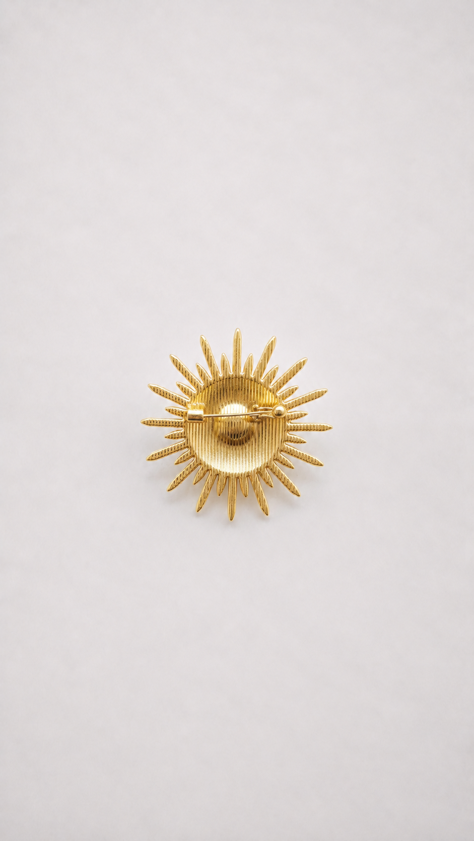 QELOS Brooch